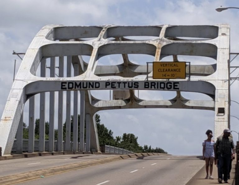 John Lewis, civil rights giant, crosses Selma bridge on way to Montgomery one final time